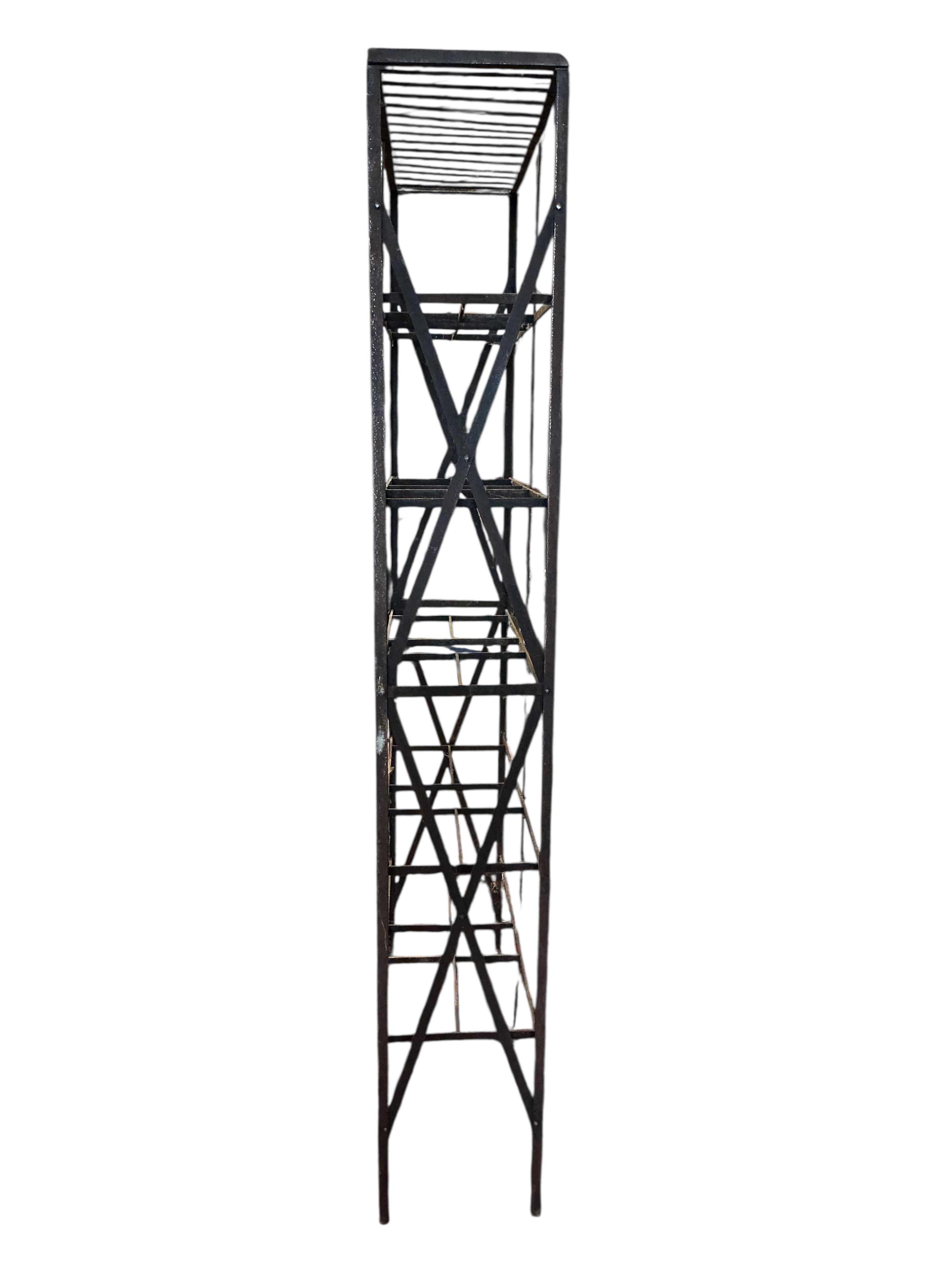 A 19th century blacksmith made five tier rack, width 107cm, depth 36cm, height 235cm
